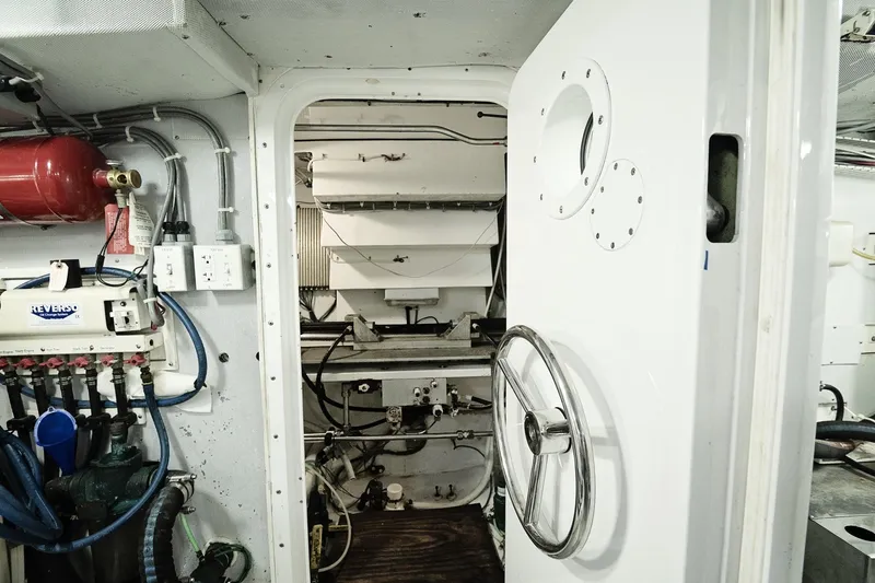 Slide: The Image of Engine room of 2007 Pilot Cruiser Expedition with control systems and safety equipment. - 64