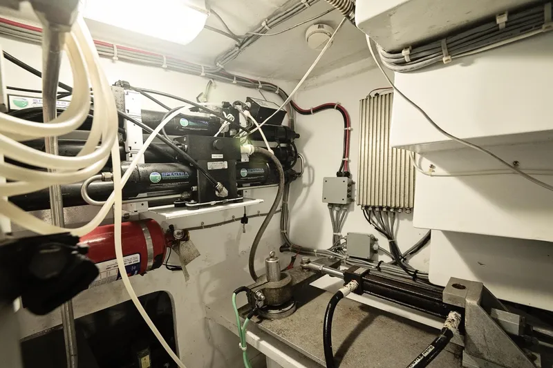 Slide: The Image of Engine room of 2007 Pilot Cruiser Expedition with mechanical and electrical components. - 65