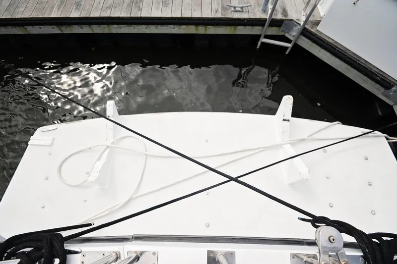 Slide: The Image of 2007 Pilot Cruiser Expedition boat docked with ropes and water reflection. - 73