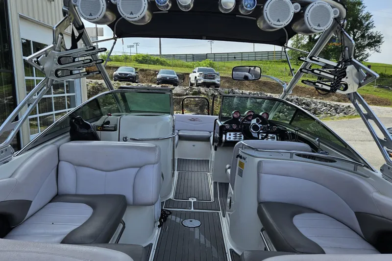 Slide: The Image of Interior view of a 2006 MasterCraft X-80 boat with seating and dashboard. - 5