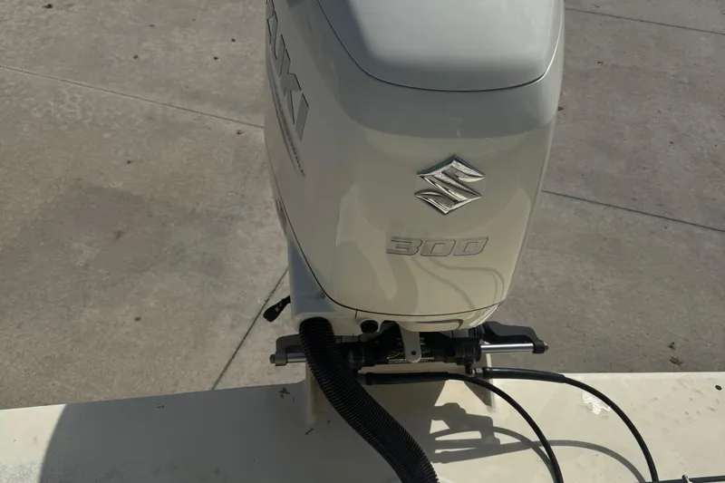 Slide: The Image of Suzuki 300 outboard motor on 2008 Parker 2510 XL Walkaround boat. - 10