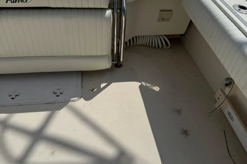 Slide: The Image of 2008 Parker 2510 XL Walkaround boat interior with seating and deck details. - 20