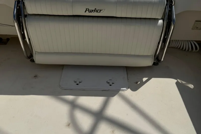 Slide: The Image of 2008 Parker 2510 XL Walkaround boat seat with storage compartment. - 21