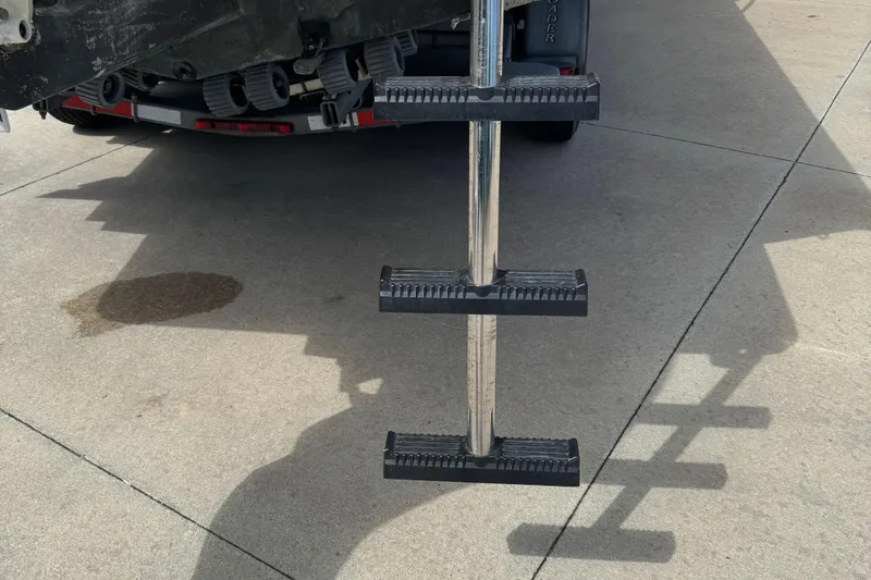 Slide: The Image of Ladder attached to a 2008 Parker 2510 XL Walkaround boat on a trailer. - 30