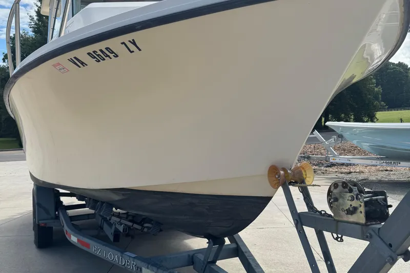 Slide: The Image of 2008 Parker 2510 XL Walkaround boat on trailer, side view. - 4