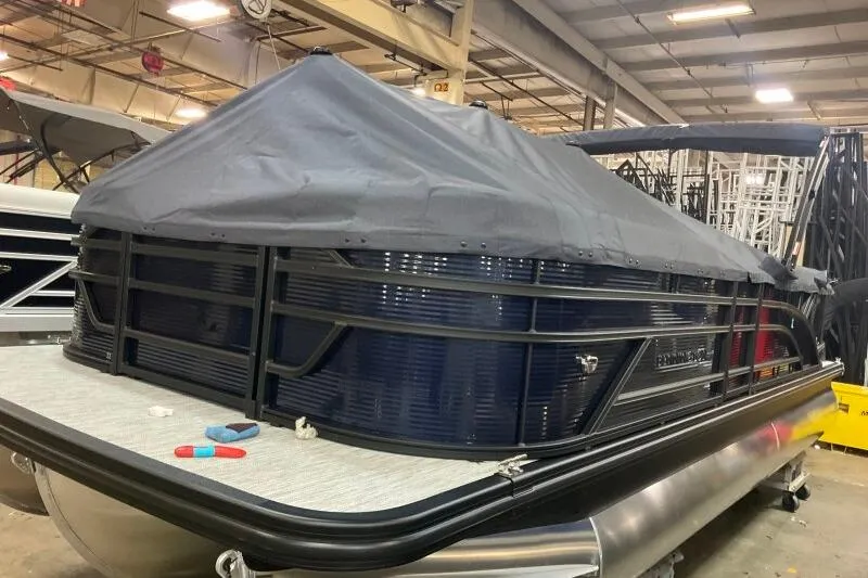 Slide: The Image of 2026 Bennington 22 SSRSF boat dashboard with steering wheel and control panel. - 12