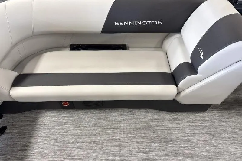 Slide: The Image of 2026 Bennington 22 SSRSF boat interior with gray seating and central table. - 17