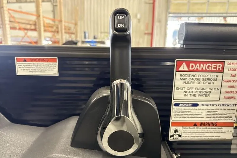 Slide: The Image of 2026 Bennington 22 SSRSE pontoon boat in a factory setting, showcasing sleek design. - 20