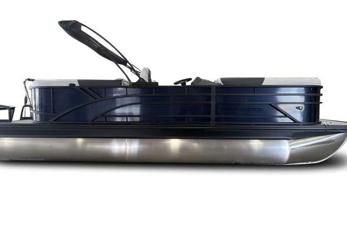 Slide: The Image of 2026 Bennington 22 SSRSE pontoon boat in a factory setting, under construction. - 5