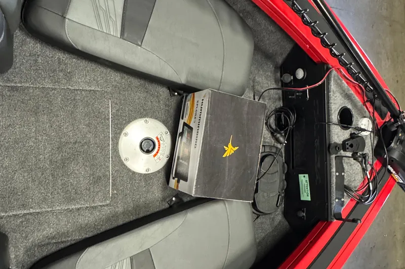 Slide: The Image of 2026 Tracker Targa V-18 Combo interior with seats and equipment. - 10