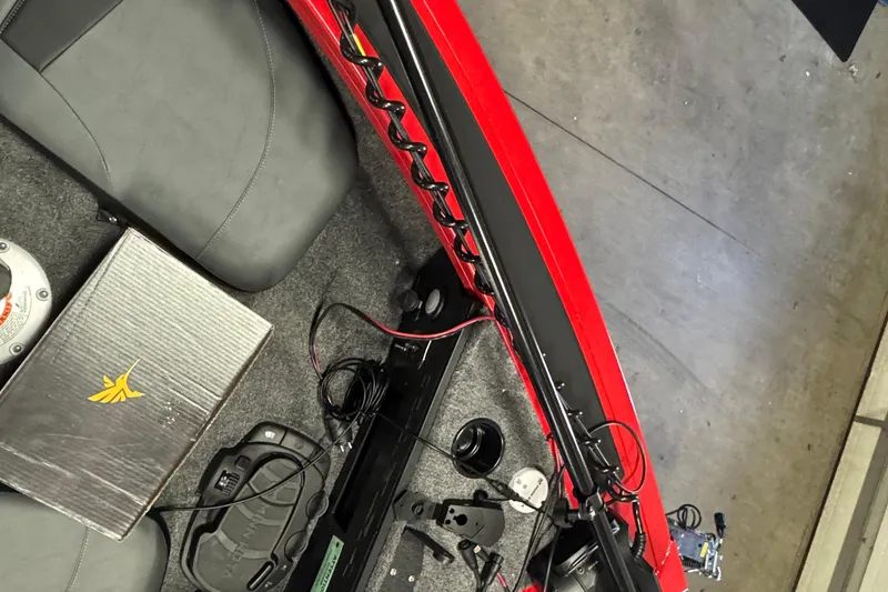 Slide: The Image of Interior view of 2026 Tracker Targa V-18 Combo boat with equipment and wiring. - 11