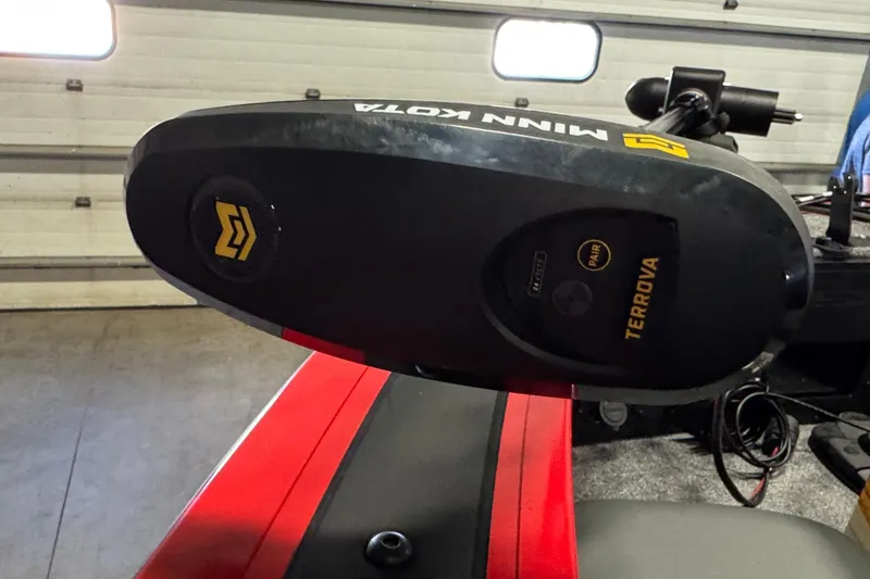 Slide: The Image of Minn Kota Terrova motor on 2026 Tracker Targa V-18 Combo boat in garage. - 12