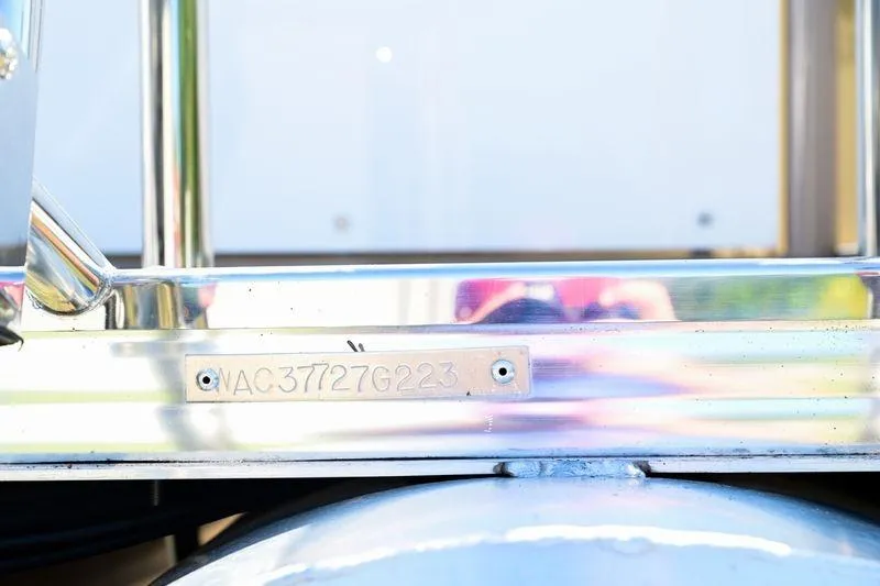 Slide: The Image of 2023 Aloha Pontoon 260 Tropical Series Sundeck with visible identification plate. - 15