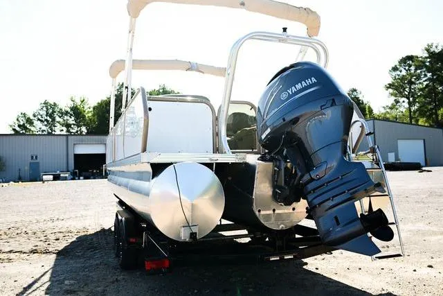 Slide: The Image of 2023 Aloha Pontoon 260 Tropical Series Sundeck with Yamaha engine on trailer. - 6