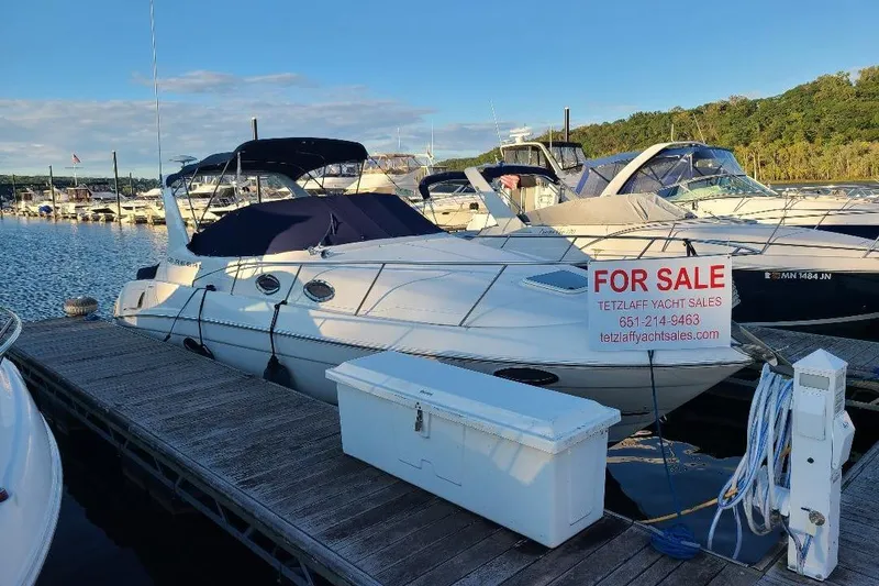 The Image of 2003 Regal Commodore 3060 yacht for sale at marina dock, sunny day. - 0