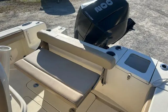 Slide: The Image of 2022 Scout 215 XSF boat with seating and Honda 200 outboard motor. - 10