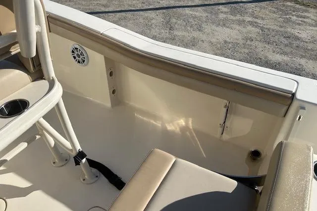 Slide: The Image of 2022 Scout 215 XSF boat interior with seating and speaker detail. - 23