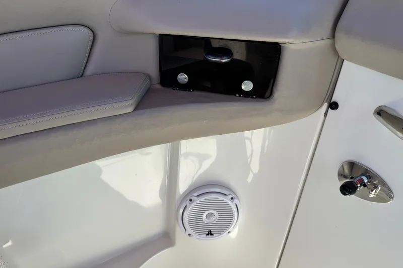 Slide: The Image of Interior of 2003 Cobalt 282 boat showing speaker and control panel. - 24