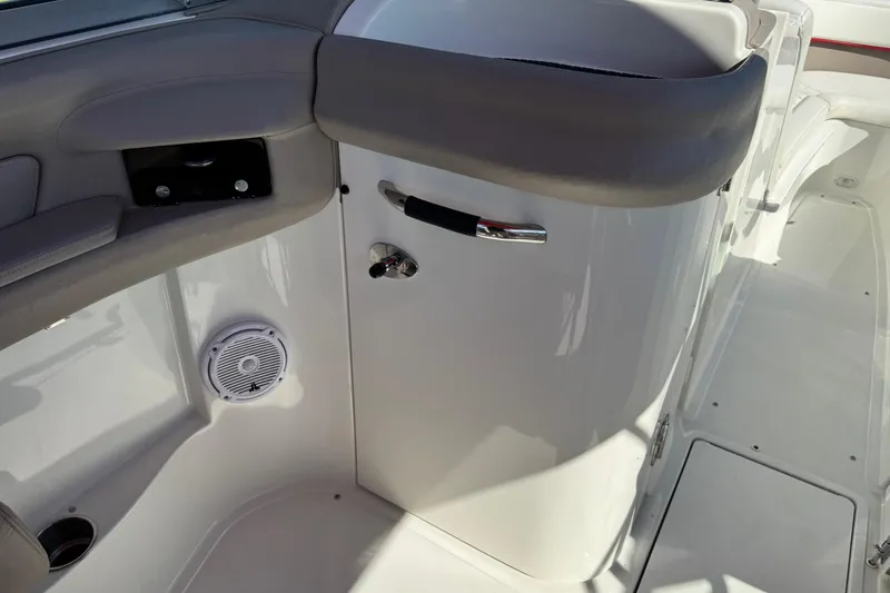 Slide: The Image of Interior of 2003 Cobalt 282 boat showing seating and speaker details. - 26
