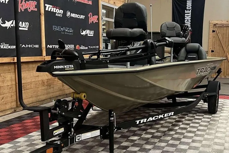 Slide: The Image of 2026 Tracker Pro Team 175 boat on display with Minn Kota Maxxum motor. - 4