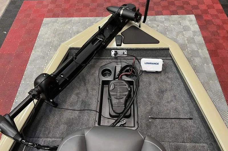 Slide: The Image of 2026 Tracker Pro Team 175 boat interior with trolling motor and Lowrance electronics. - 7