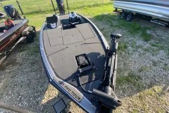 Slide: The Image of 2023 Blazer 650 Pro Tour boat on grassy area, showcasing sleek design. - 3