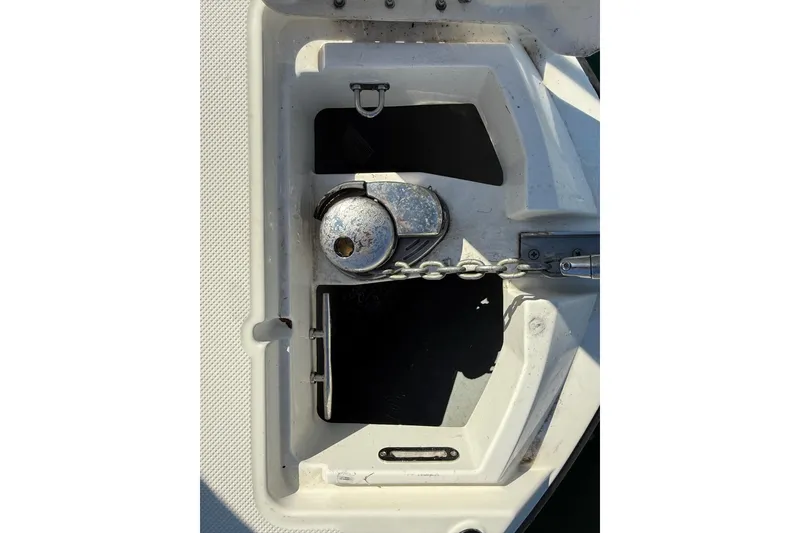 Slide: The Image of 2024 Bayliner Trophy T25 Pilothouse anchor chain and winch detail. - 25