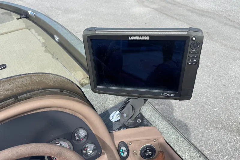 Slide: The Image of Lowrance HDS-12 fishfinder on 2000 Ranger 520DVX Comanche boat dashboard. - 12