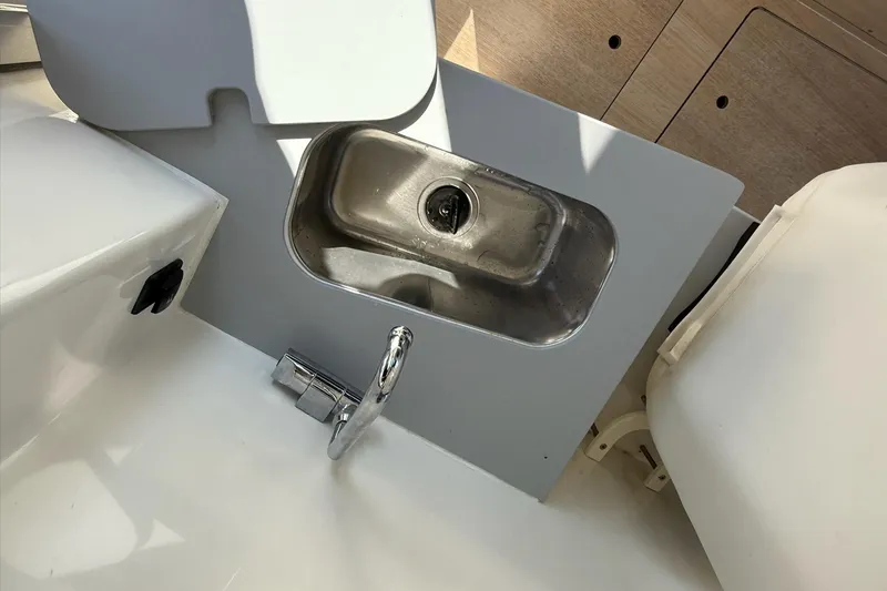 Slide: The Image of 2024 Bayliner Trophy T25 Pilothouse sink and faucet detail. - 45