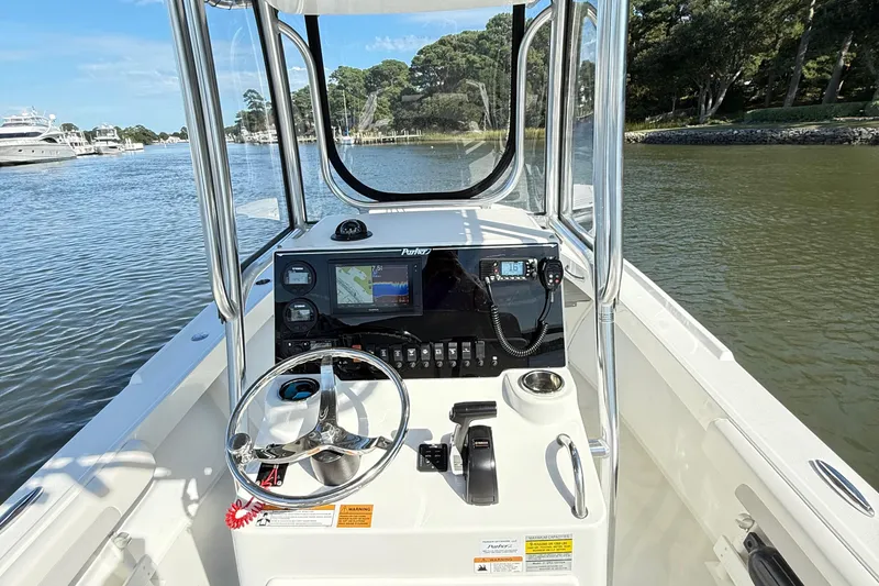 Slide: The Image of 2020 Parker 2100 Special Edition boat console with steering wheel and navigation system. - 10