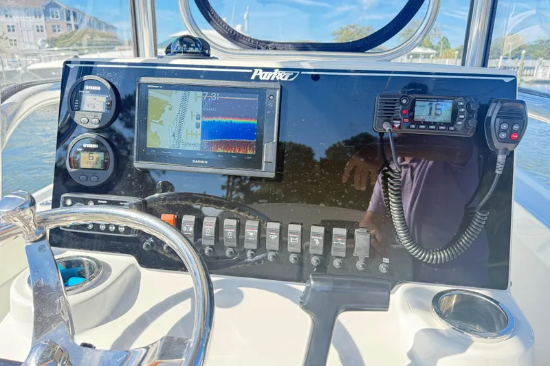 Slide: The Image of Control panel of 2020 Parker 2100 Special Edition boat with navigation and communication equipment. - 12
