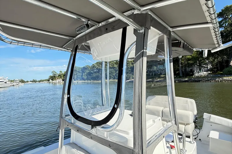 Slide: The Image of 2020 Parker 2100 Special Edition boat console with capacity and warning labels. - 37