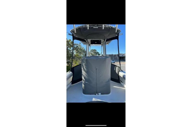 Slide: The Image of 2020 Parker 2100 Special Edition boat with covered console and T-top. - 45