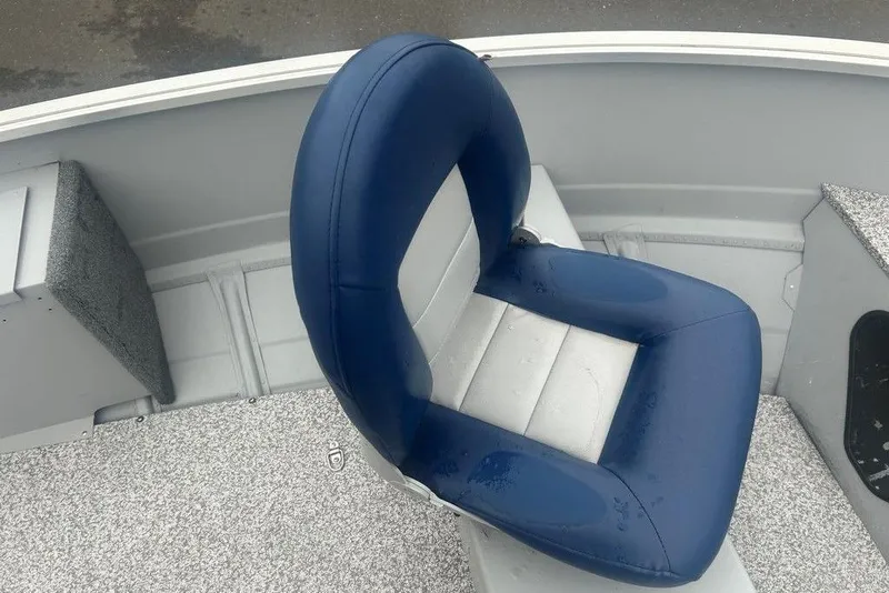 Slide: The Image of Blue and white boat seat in a 2020 MirroCraft 3673. - 10