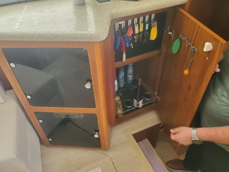 Slide: The Image of Interior storage cabinet on a 2000 Carver 356 Aft Cabin Motor Yacht. - 37