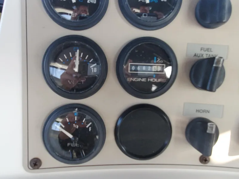 Slide: The Image of Control panel of 2000 Carver 356 Aft Cabin Motor Yacht with gauges and switches. - 8