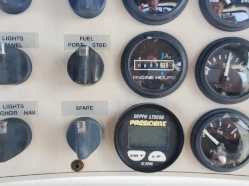 Slide: The Image of Control panel of 2000 Carver 356 Aft Cabin Motor Yacht with gauges and switches. - 9