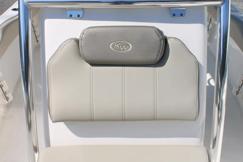 Slide: The Image of 2024 Key West 219 FS boat seat with KW logo and stainless steel frame. - 8