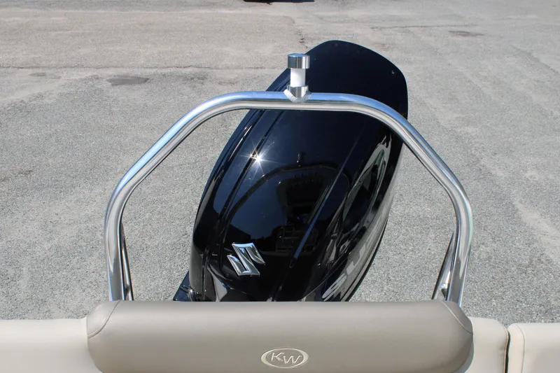 Slide: The Image of 2024 Key West 219 FS boat with Suzuki outboard motor, rear view. - 9