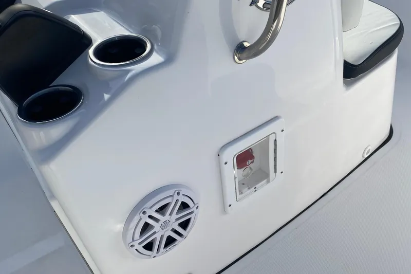 Slide: The Image of 2024 Tidewater 180 CC Adventure boat console with cup holders and speaker. - 10