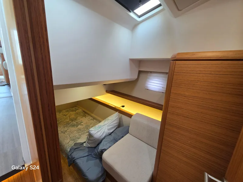 Slide: The Image of Cozy cabin interior of 2022 Greenline 39 Hybrid yacht with modern furnishings. - 12