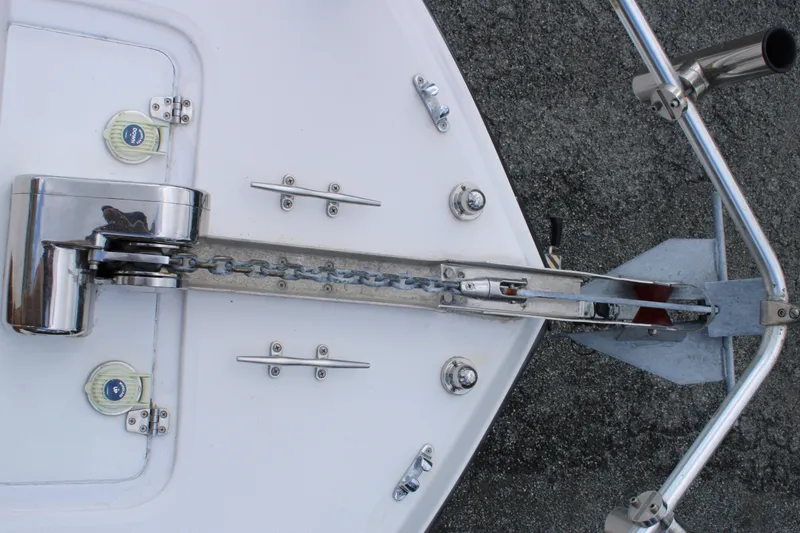 Slide: The Image of Bow view of 2005 Angler 220 WA boat with anchor and chain mechanism. - 24