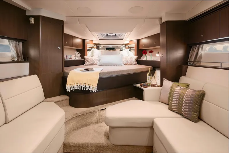 Slide: The Image of Luxurious interior of 2018 Sea Ray Sundancer 350 Coupe with cozy seating and elegant decor. - 43