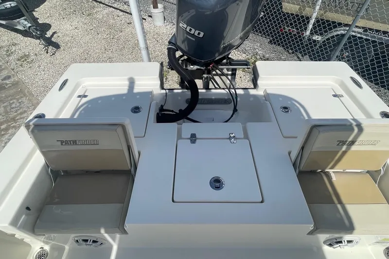 Slide: The Image of 2016 Pathfinder 2200 TRS boat with Yamaha 200 engine, featuring rear seating and storage. - 5