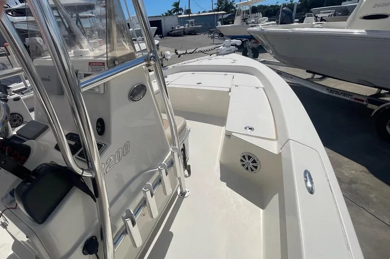 Slide: The Image of 2016 Pathfinder 2200 TRS boat interior with console and seating area. - 8