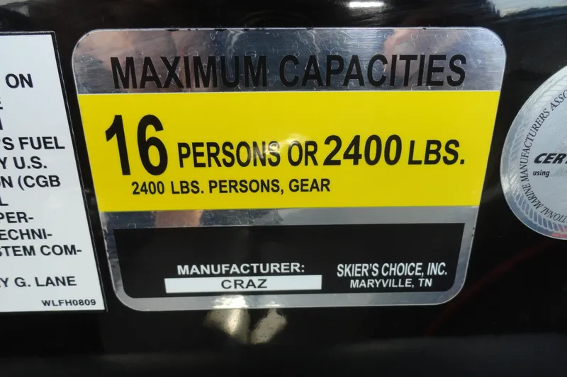Slide: The Image of 2017 Moomba Craz capacity label: 16 persons or 2400 lbs, manufactured by Skier's Choice, Inc. - 13