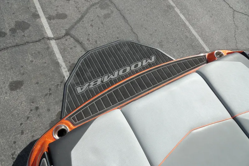 Slide: The Image of 2017 Moomba Craz boat swim platform with logo, featuring sleek design and cushioned seating. - 19