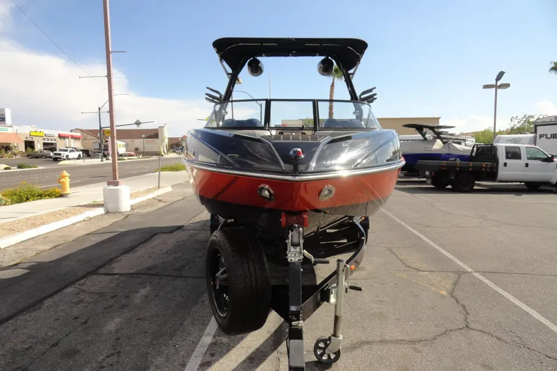Slide: The Image of 2017 Moomba Craz boat on trailer in parking lot, front view. - 3