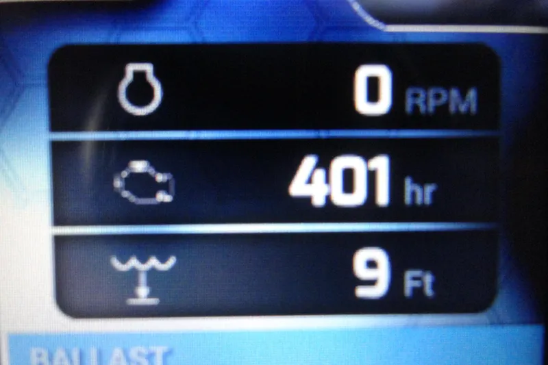 Slide: The Image of Display panel of 2017 Moomba Craz showing 0 RPM, 401 hours, 9 feet depth. - 9