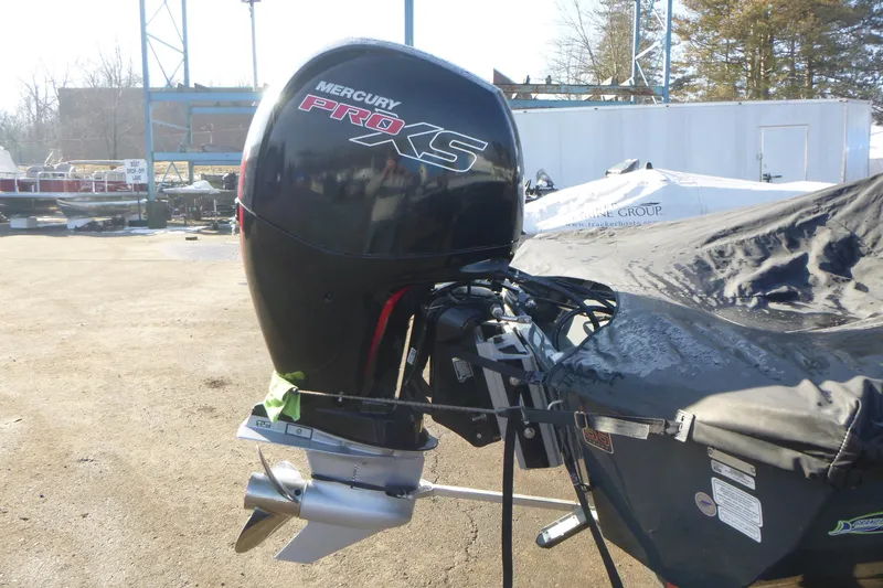 Slide: The Image of 2023 Ranger RT198P boat with Mercury Pro XS outboard motor in a marina setting. - 17